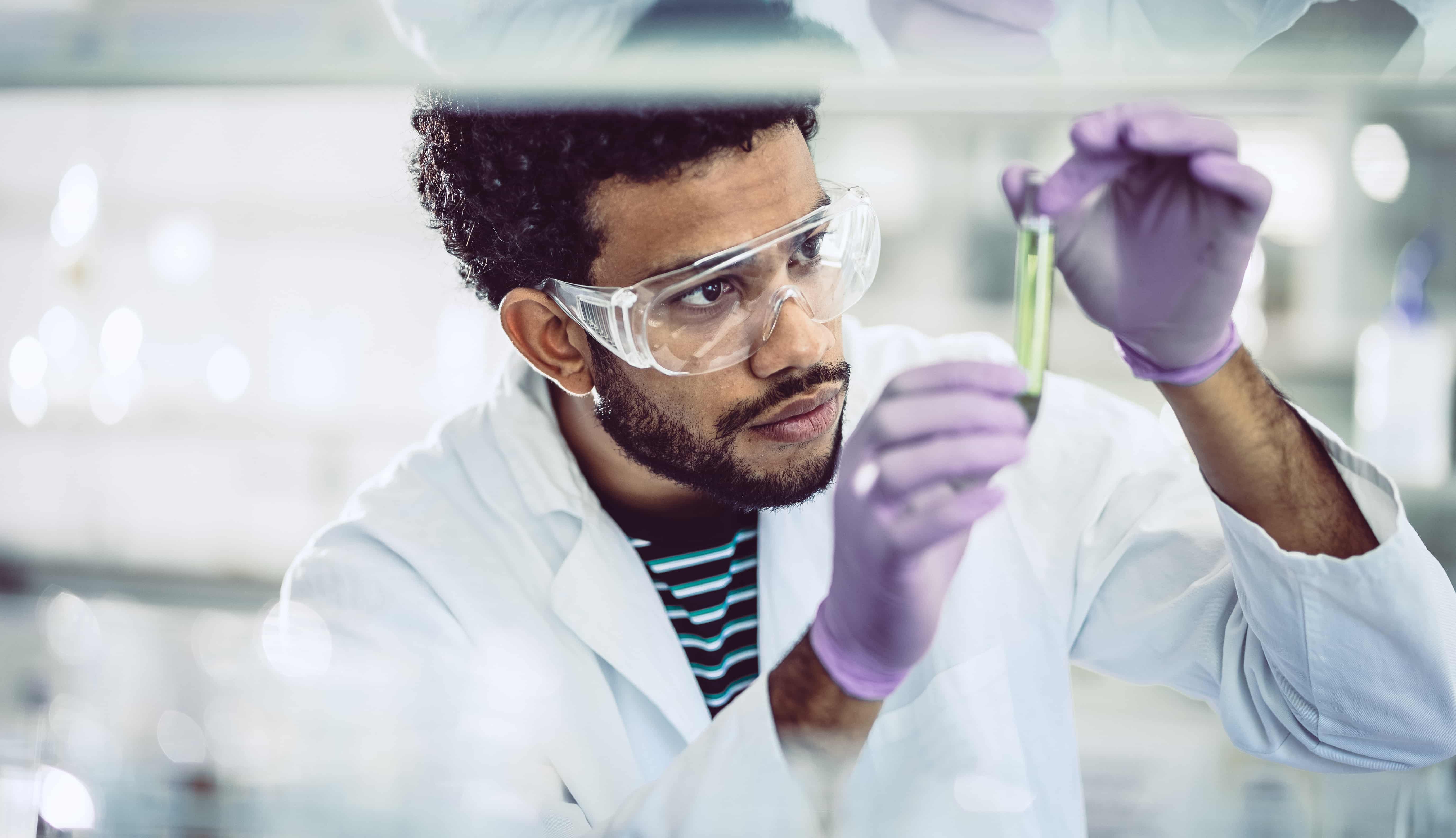 Researcher with test tube